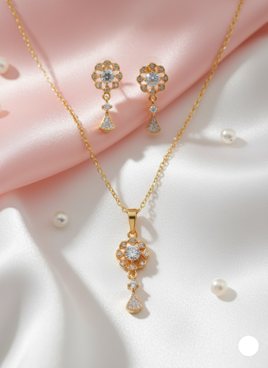 earing and necklase gold