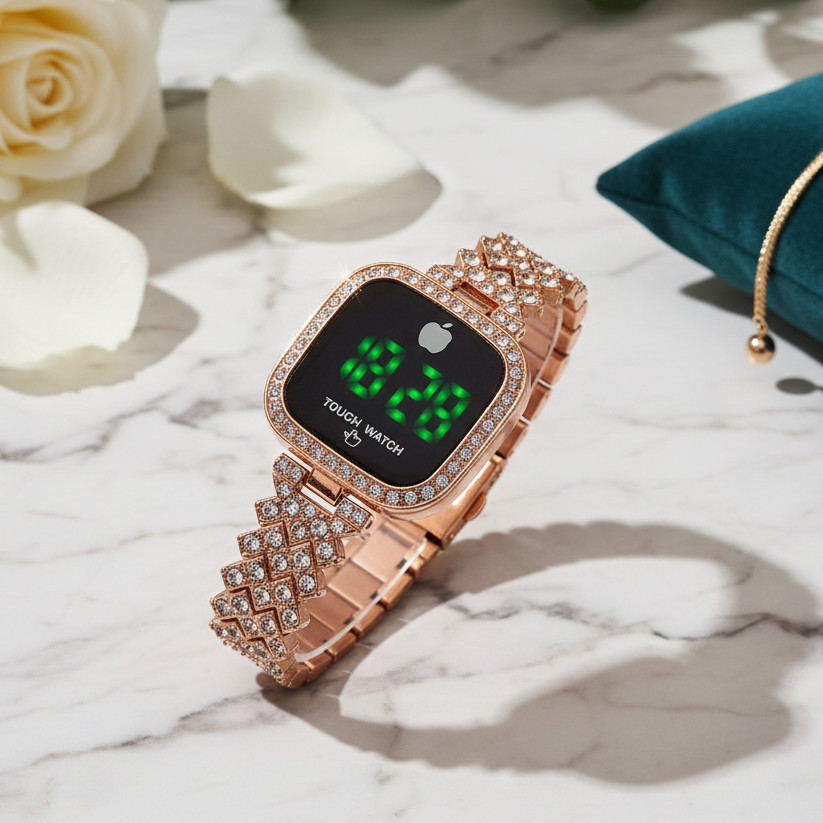 Rose gold smartwatch with digital display on a marble surface with white roses and a green pillow.